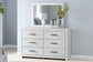 Cayboni Queen Panel Bed with Mirrored Dresser