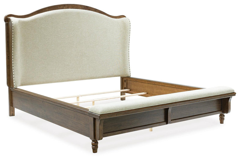 Sturlayne California King Upholstered Panel Bed, Dresser, Mirror and Nightstand