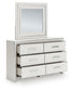 Zuraleus Queen Upholstered Panel Bed, Dresser, Mirror, Chest and Nightstand