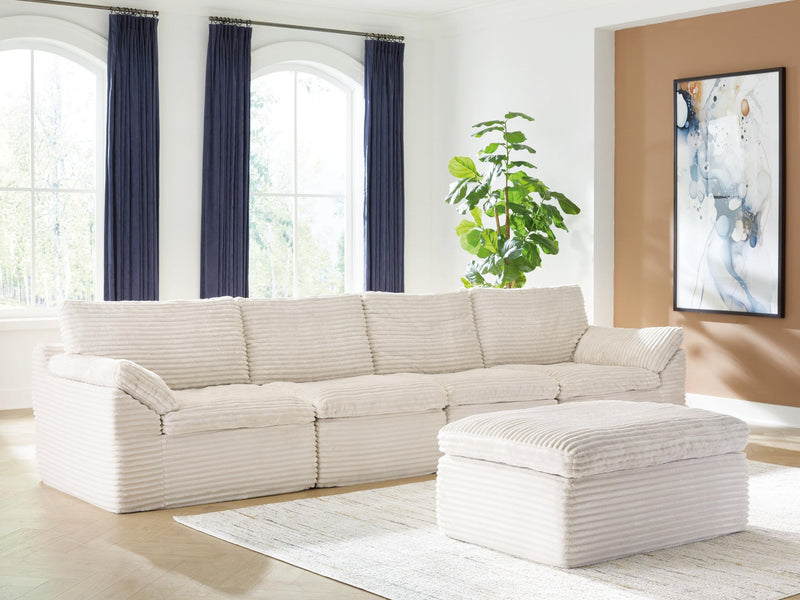 Ashley Express - Fannin 4-Piece Sectional with Ottoman